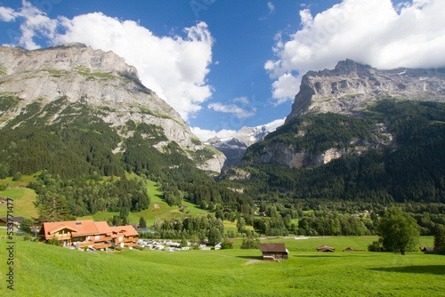 Alpine village surrounded by Mountains in Grindelwald, Switzerland