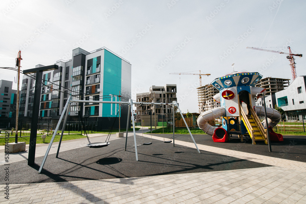 a new playground for active recreation and workout in a modern courtyard of a residential area a new playground for active recreation and workout in a modern courtyard of a residential area