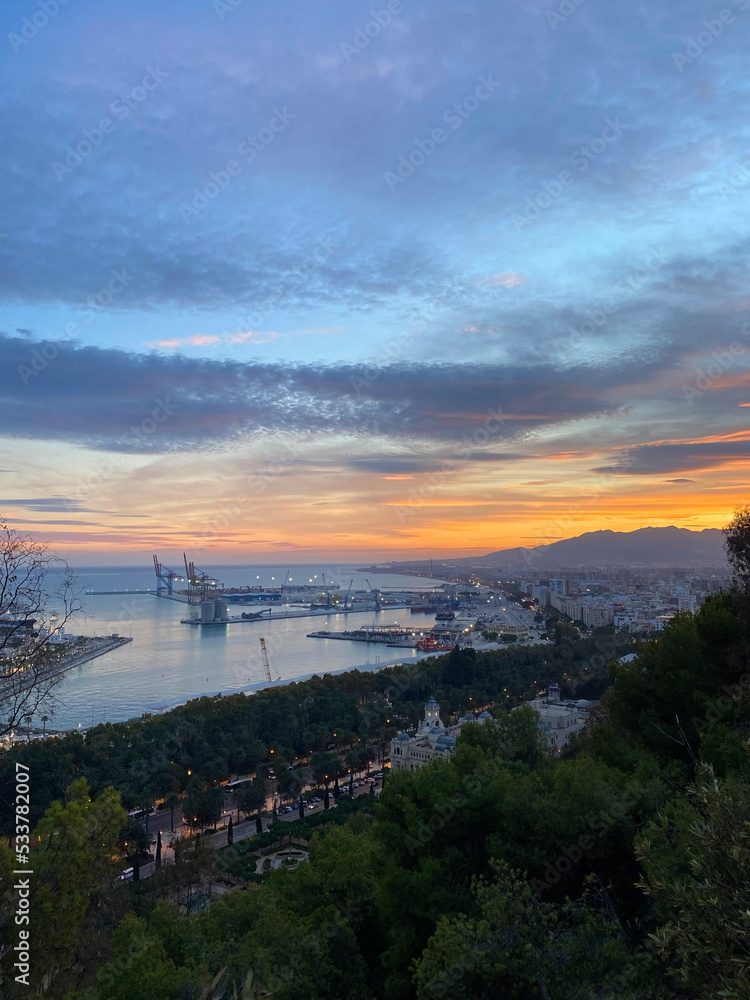aerial view of the beautiful sunset in Malaga harbor, Andalusia, Spain. High quality photo
