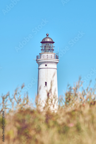 Lighthouse at the danish coast in Hirtshals. High quality photo