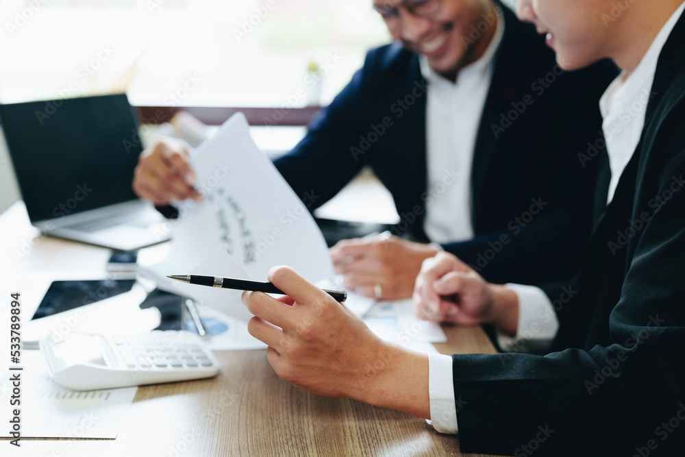 Teamwork concept, consultation, male economist using documents budget, finance and investment documents, discussing and planning finances with female advisors in conference room Teamwork concept, consultation, male economist using documents budget, finance and investment documents, discussing and planning finances with female advisors in conference room