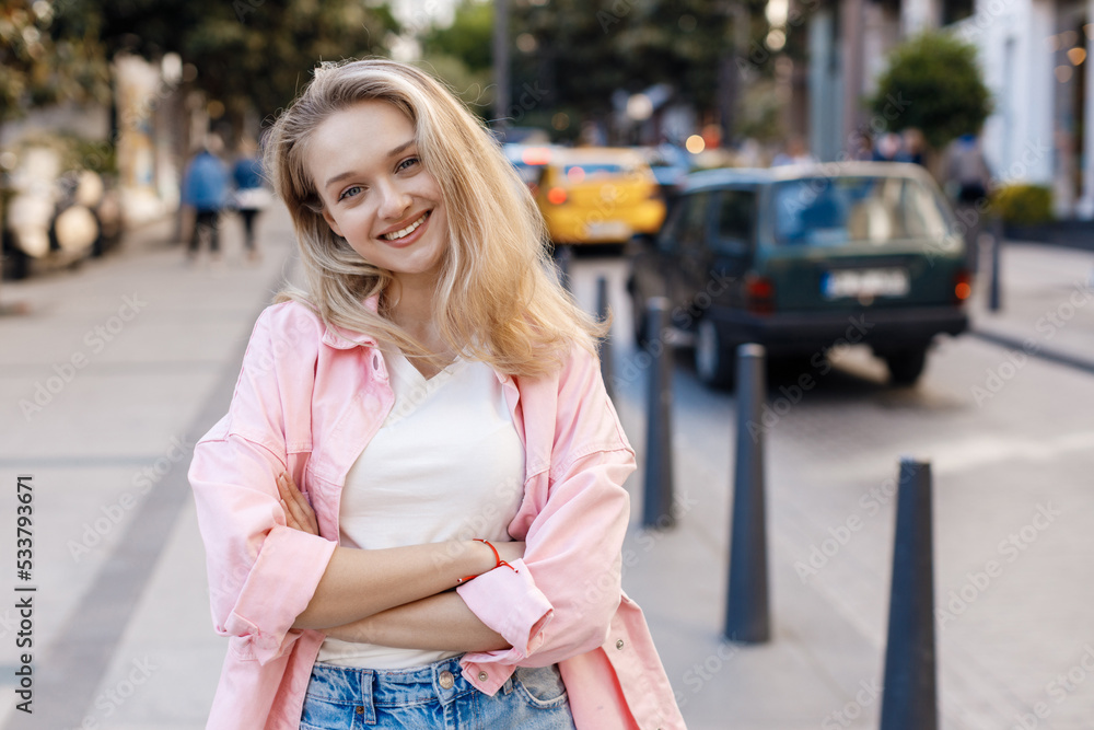 young pretty blond woman portrait outdoor