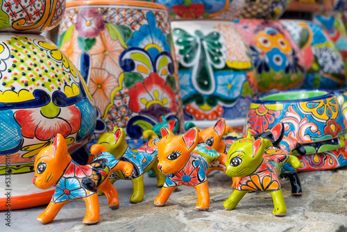Todos Santos, Mexico. Colorful pottery cats and other items for sale.