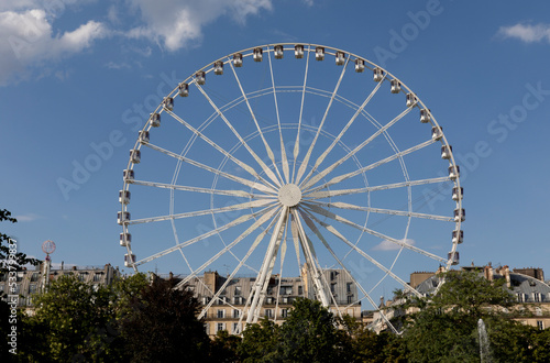 Ferris wheel view from Tuileries in Paris, France.