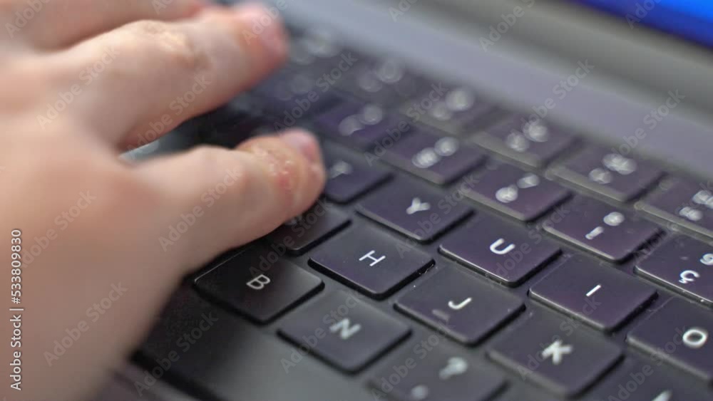 a close-up macro shot of hands trying to find placement before beginning to type on a computer laptop keyboard a close-up macro shot of hands trying to find placement before beginning to type on a computer laptop keyboard