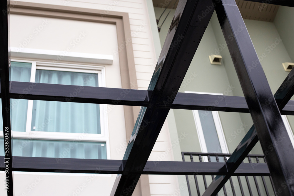 Fototapeta premium Steel roof structure. Build a room addition