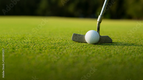 golfer aim direction put golf ball on green to the hole © sattahipbeach