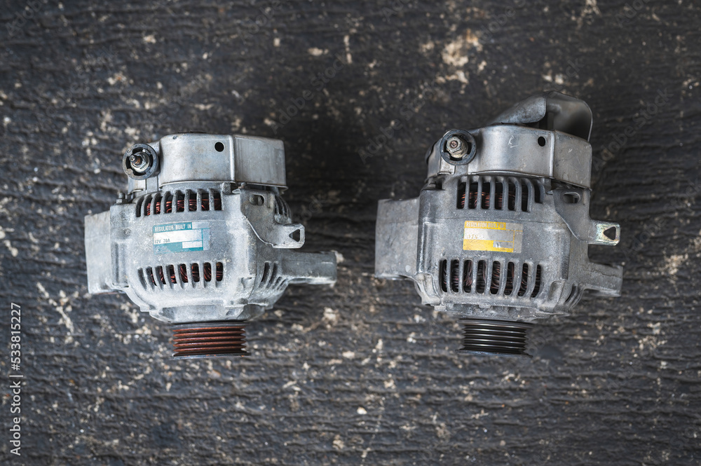 Close-up of old used car alternator. Close-up of old used car alternator.