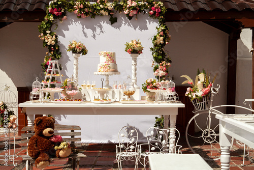 baptism reception party decor set up family religious celebration cake