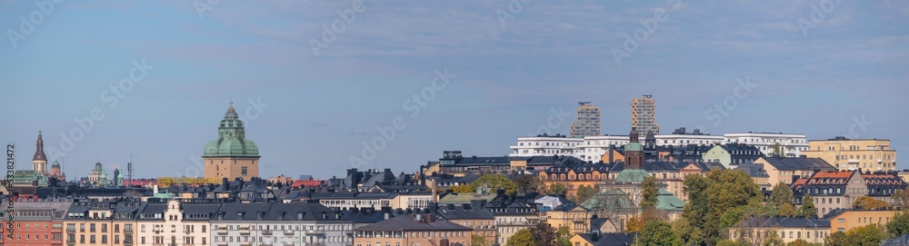 Facades, roofs, dorms and towers in the district Kungsholmen an autumn day in Stockholm