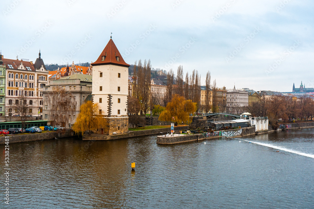 Beautiful view of Prague along Vltava River . Historic and romantic old town during winter . Prague , Czech : December 12 , 2019 Beautiful view of Prague along Vltava River . Historic and romantic old town during winter . Prague , Czech : December 12 , 2019