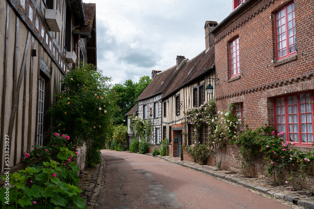 One of most beautiful french villages, Gerberoy - small historical village with half-timbered houses and colorful roses flowers, France One of most beautiful french villages, Gerberoy - small historical village with half-timbered houses and colorful roses flowers, France