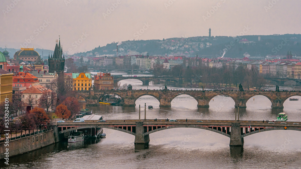 Beautiful view , cityscape and bridges at Letna park at Letna hill in Prague old town , along the Vltava River during winter . Prague , Czech  : December 12 , 2019