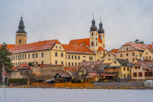 Telc , beautiful old town , buildings along the river during winter morning : Telc , Czech : December 14, 2019