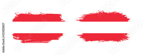 Set of two grunge brush flag of Austria on solid background
