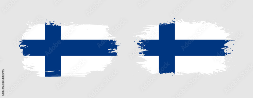 Set of two grunge brush flag of Finland on solid background Set of two grunge brush flag of Finland on solid background