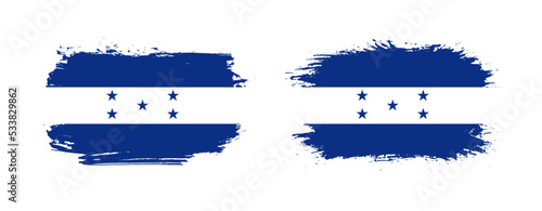 Set of two grunge brush flag of Honduras on solid background