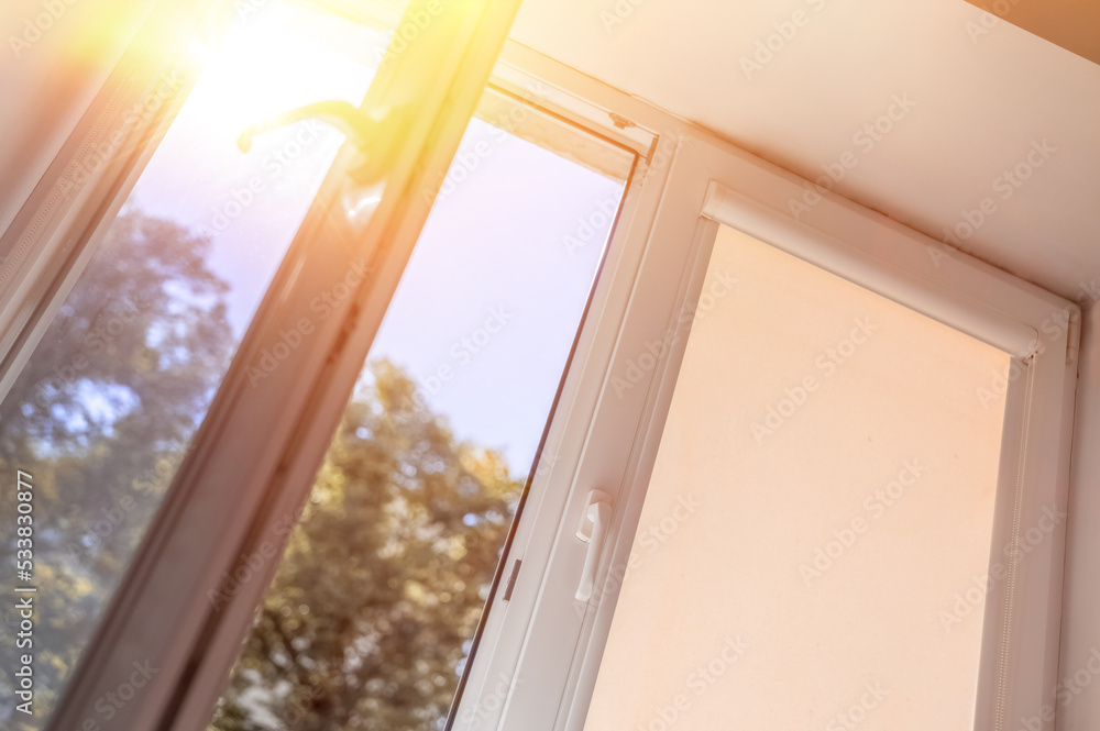 Window Home Sun Rays The sun's rays penetrate through the open window in the house on a ...