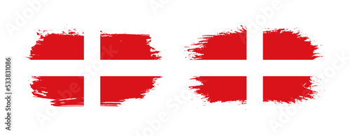 Set of two grunge brush flag of Sovereign Military Order of Malta on solid background