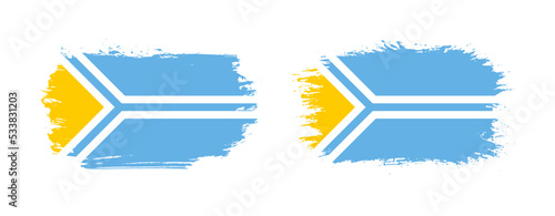 Set of two grunge brush flag of Tuva on solid background