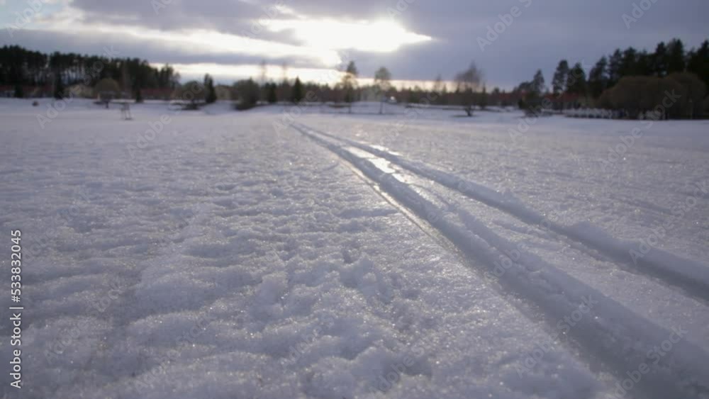 Fresh trail lines carved into pristine powder white snowy woodland landscape Katinkulta Vuokatti Finland Fresh trail lines carved into pristine powder white snowy woodland landscape Katinkulta Vuokatti Finland