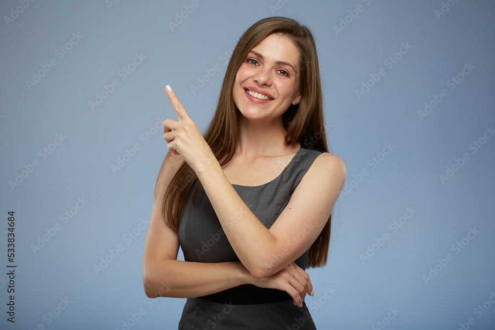 Smiling business woman pointing up with finger at copy space. isolated portrait. Smiling business woman pointing up with finger at copy space. isolated portrait.