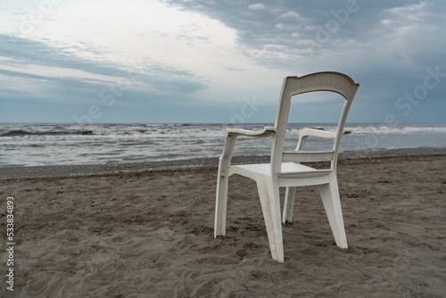 Lonely chair on sea beach