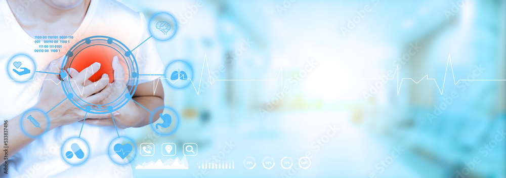 Medical technology diagnosis heart disease concept. woman touching heart. Symptoms of heart disease. Medical technology analyzes the virtual screen interface network connection. hospital background.