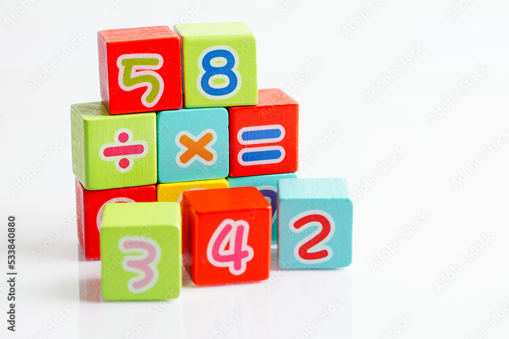 Number wood block cubes for learning Mathematic, education math concept. Number wood block cubes for learning Mathematic, education math concept.