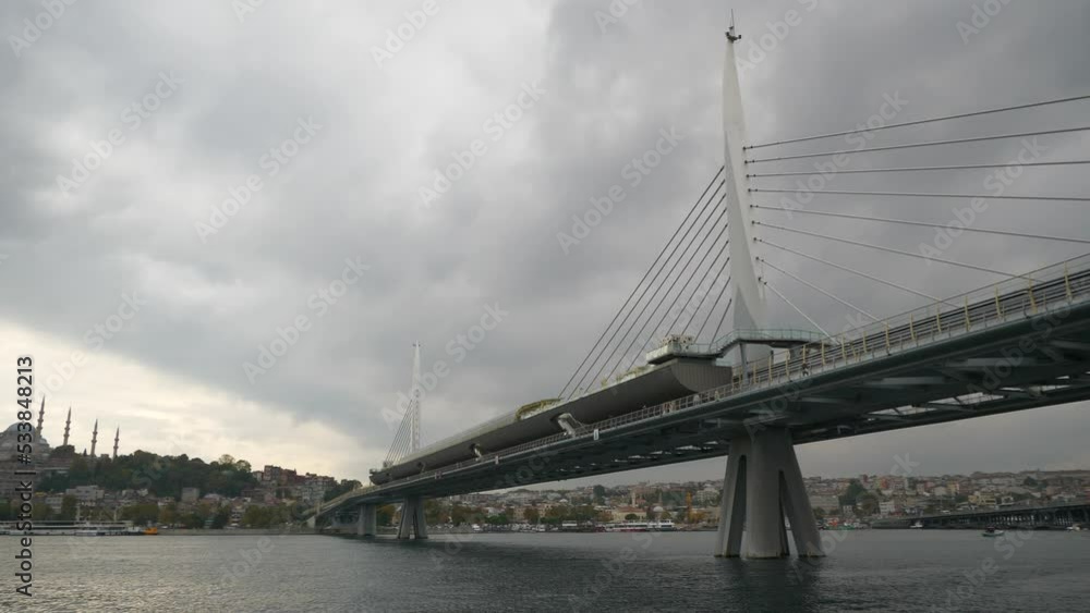 cloudy day istanbul city famous bay metro bridge slow motion panorama 4k turkey