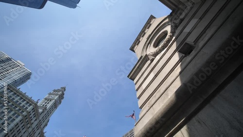 Chicago USA, DuSable Bridge House and American National and Illinois Flags Waving Under Skyscrapers, Low Angle Panorama