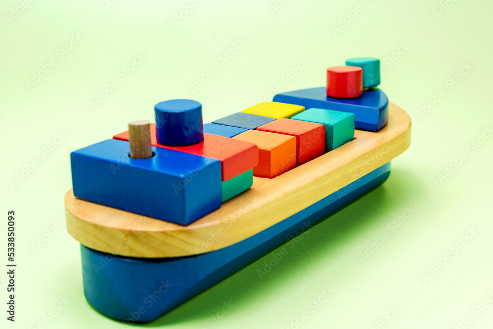 Fototapeta premium A colorful wooden toy ship
