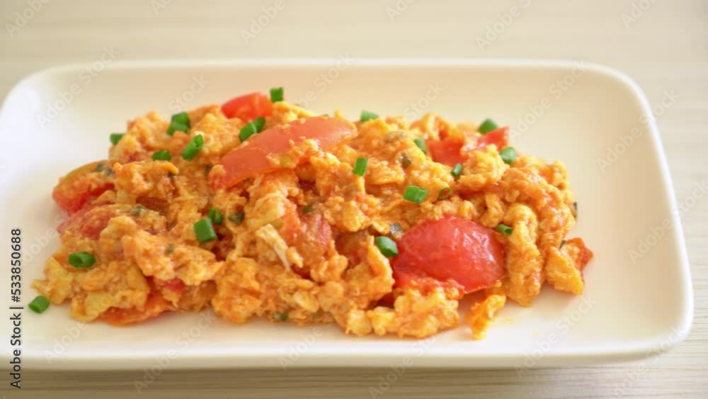 Stir-fried tomatoes with egg or Scrambled eggs with tomatoes - healthy food style Stir-fried tomatoes with egg or Scrambled eggs with tomatoes - healthy food style