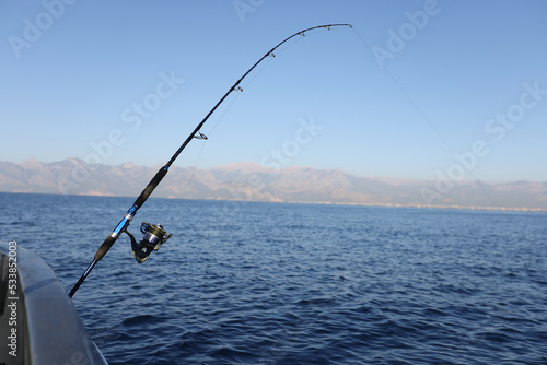 Sea fishing from steel fishing boat on open water