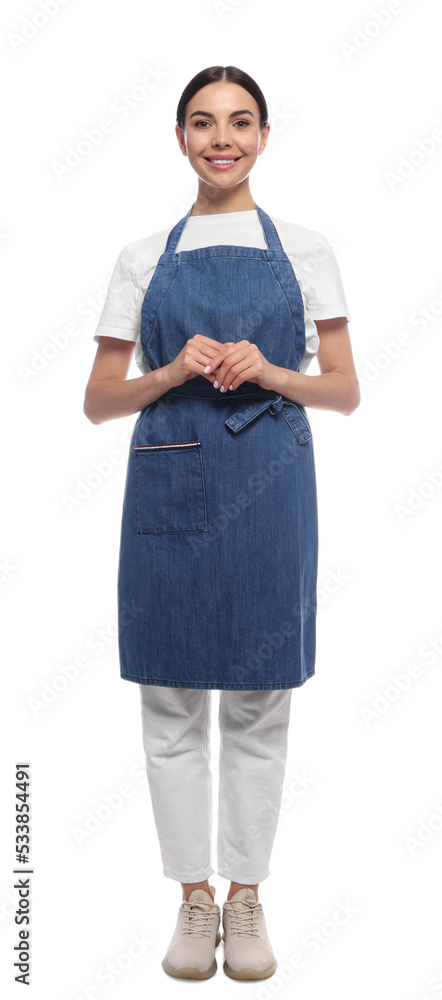 Young woman in blue jeans apron on white background Young woman in blue jeans apron on white background