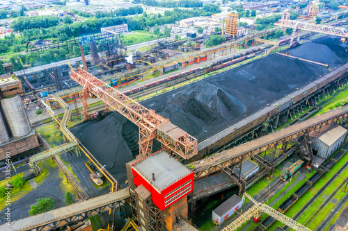 Open-air coking coal warehouse on the territory of coke plant. View from above