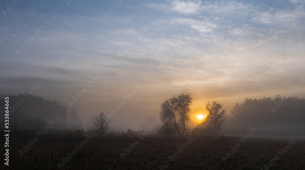 Autumn, misty morning and sunrise in the countryside Autumn, misty morning and sunrise in the countryside