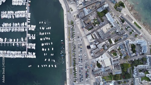 the port of concarneau in brittany (france), droneshot filmed from above, sunny weather photo
