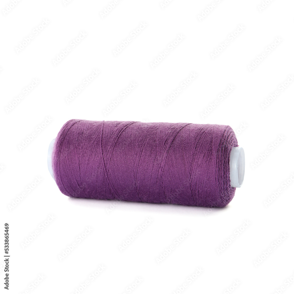 Spool of purple sewing thread isolated on white Spool of purple sewing thread isolated on white