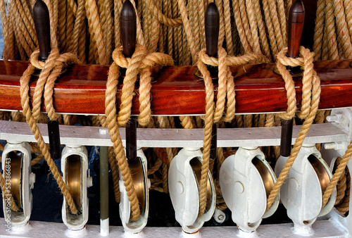 detail - Palinuro - three masted, iron hulled barquentine, active as sails trainings vessel for the Italian Navy, moored in Olbia harbor, Sardinia, Italy photo