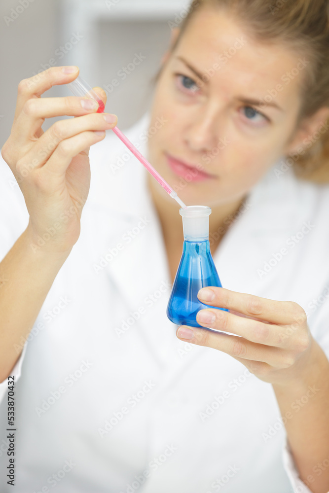lab assistant in glasses holds in hands lab assistant in glasses holds in hands