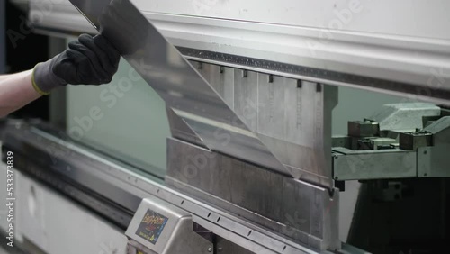 Hydraulic sheet bending machine in use