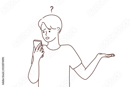 Confused man look at cellphone frustrated by problem 