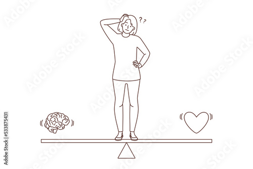 Confused woman choose between brain and heart