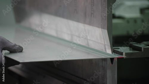 Hydraulic sheet bending machine in use