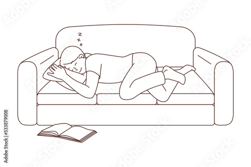 Young woman sleeping on sofa