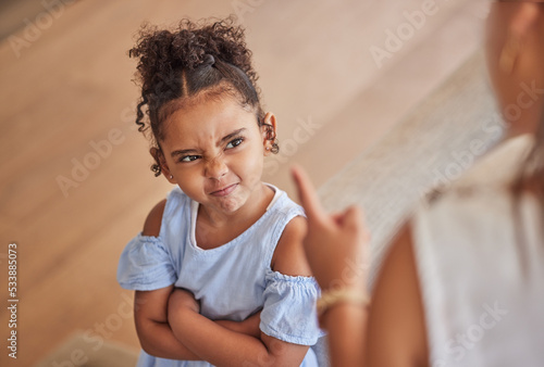 Fototapeta Angry child and tantrum discipline conflict for attitude problem in home with stressed mother