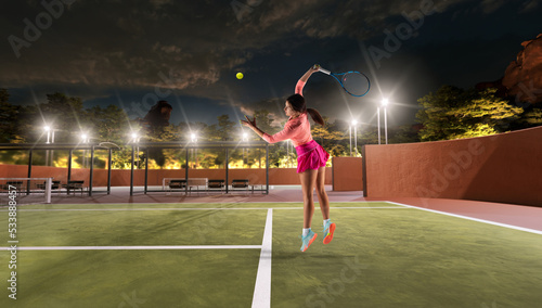 Woman playing tennis in professonal tennis court