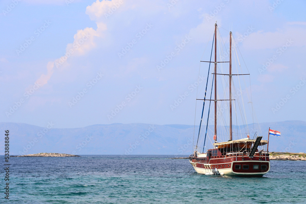 Sailing boat and beautiful Adriatic sea landscape in Croatia. Sailing boat and beautiful Adriatic sea landscape in Croatia.