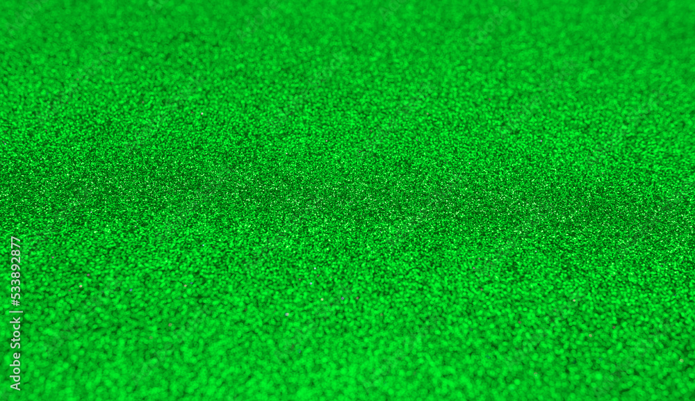 Fototapeta premium Festive background of small sparkles. There is a place to place your text.